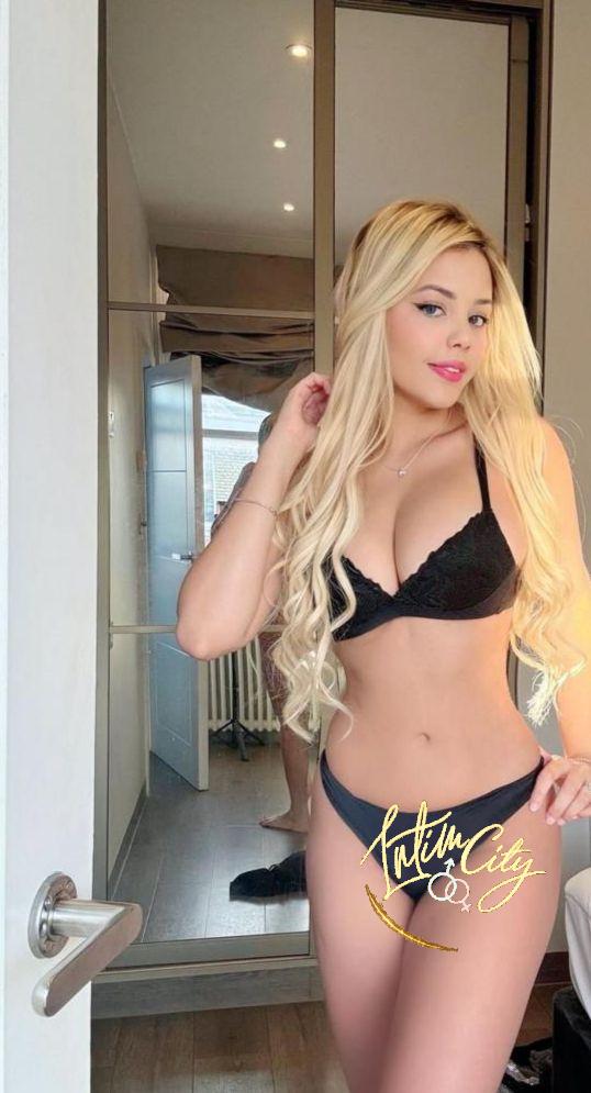 Blonde elite escort London.